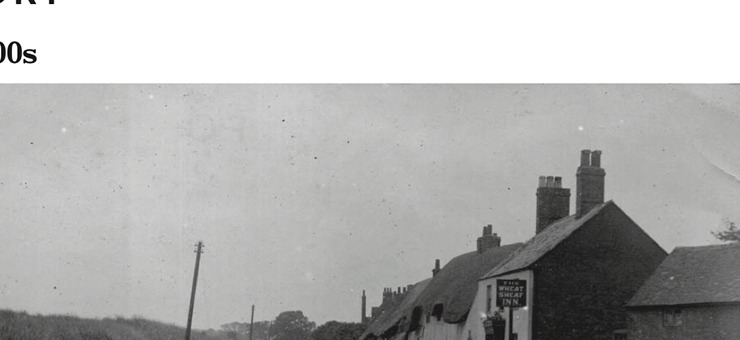 Historic view of The Wheatsheaf and village street