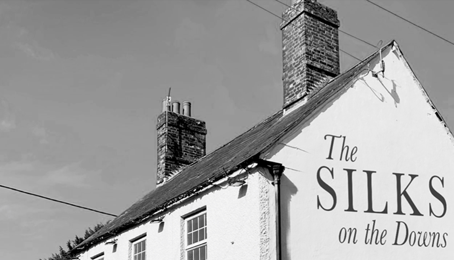 The Silks signage on the pub wall